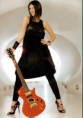 /album/fotos-antigas/laura-pausini-com-guitarra-jpg/